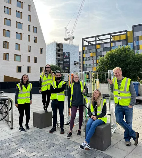 Image of members of staff in high visibility jacket 