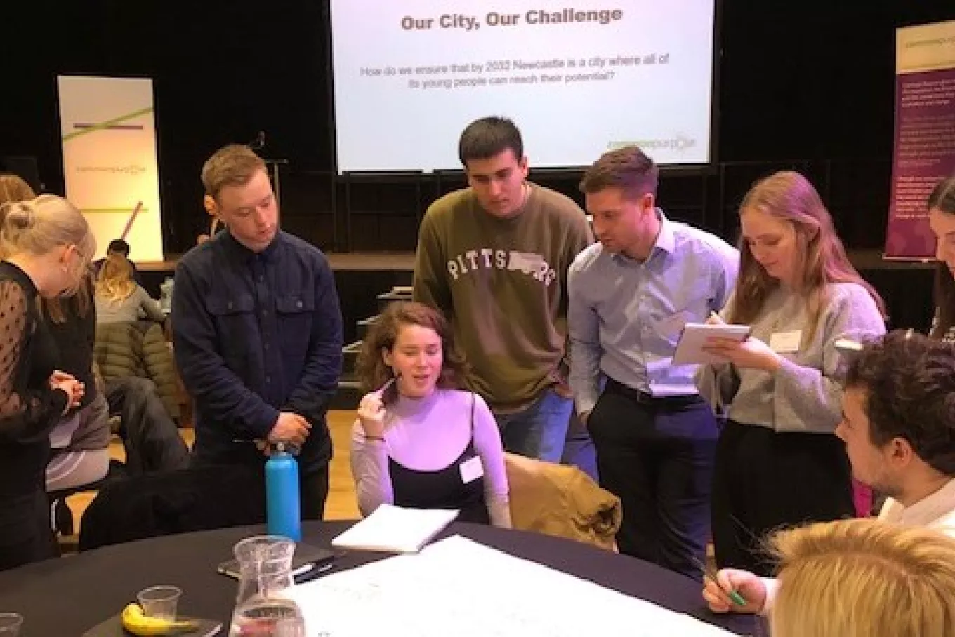 people collaborating in workshop