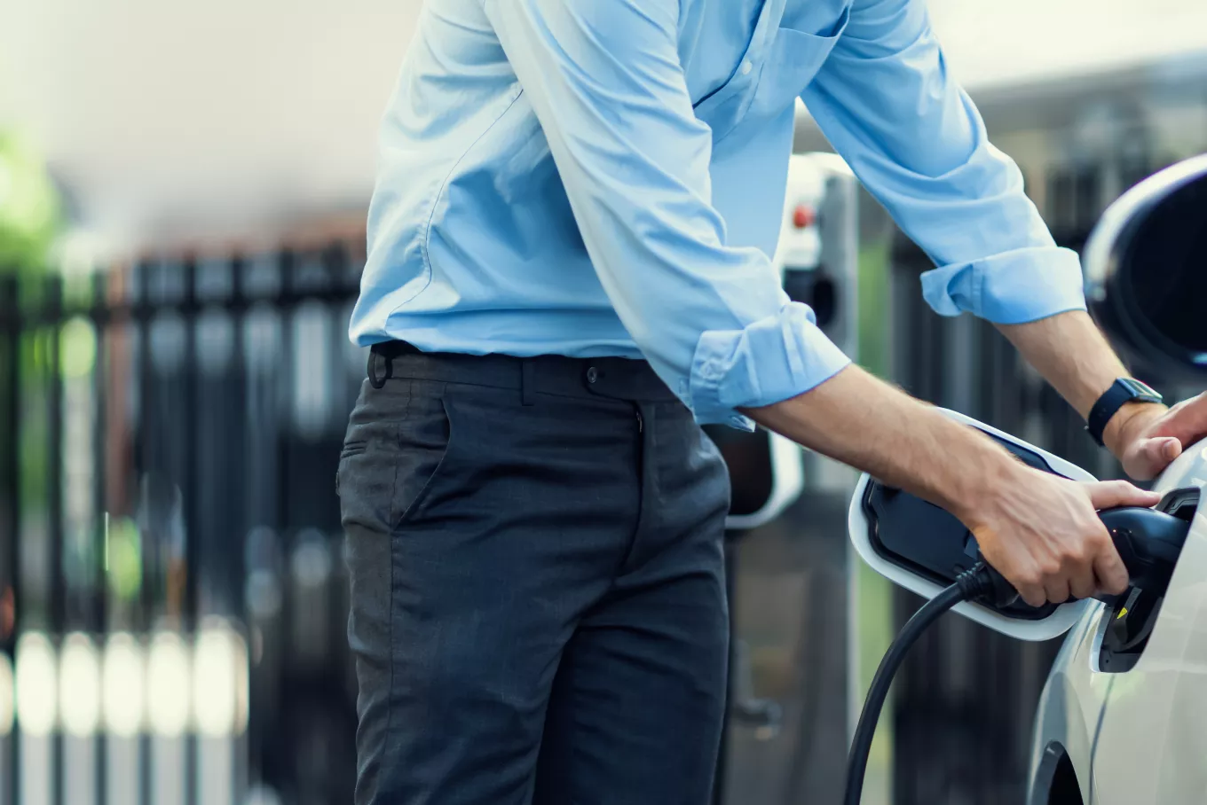 Man charging EV