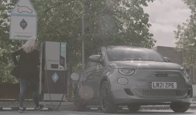 Grey Fiat 500 EV being charged on the genie point network