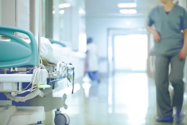 stock image showing hospital beds in walkway