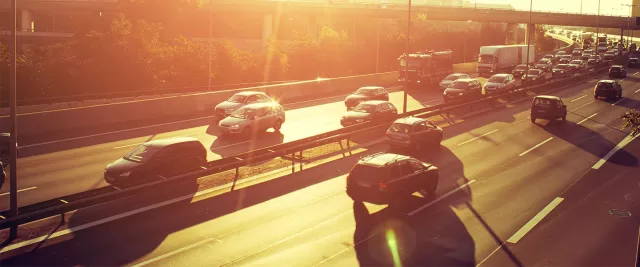 Cars on a motorway in the sun